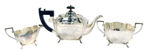 A silver plated three piece tea service, comprising teapot, milk jug and two handled sugar bowl, the teapot bearing presentation inscription for The Sleaford Xmas Fatstock Show 1930, presented by Sir Victor Warrender, Bart, MP, for the Best Pig Exhibited