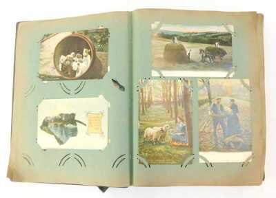 A 19thC and later postcard album, including topographical postcards for Heilbron, Grimsthorpe Castle Bourne, Scarborough, humorous postcards, further postcards for Buxton, Manchester, Cheshire, Dublin, Birmingham, etc. (1 album)