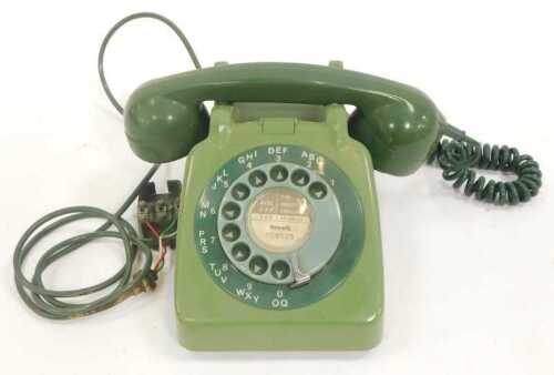 A mid century two tone green dial telephone, 706 TEA 66-2A.