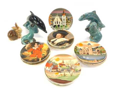 A group of Poole pottery, to include various plates depicting famous paintings, to include Boat Building Near Flatford Mill by John Constable, The Laughing Cavalier by Franz Hals, Housemartin by John Gould, together with a Poole pottery figure of a dolphi