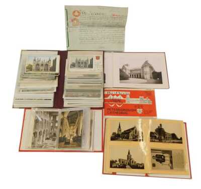 An album of postcards depicting Peterborough Cathedral from various aspects, together with Views of Spalding and District book, a further album depicting interior views of Peterborough Cathedral, an indenture between Mr WJ Richmond and The Kensington Coop