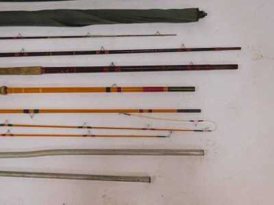 A fishing bag containing an umbrella and two rods, a Cuckoo three piece rod and a J Clayton of Boston Fenland two piece. (AF) - 3