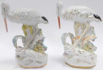 A pair of Dulevo porcelain bird figures, modelled as storks. 24cm high. - 2