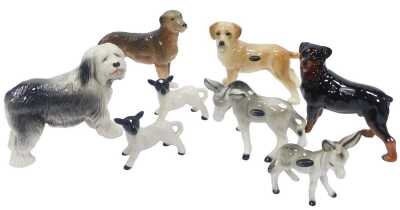 A group of Coopercraft pottery animal figures, to include donkeys and dogs, the largest 15cm high, dogs, etc. (8)