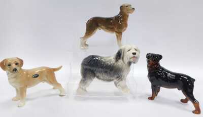 A group of Coopercraft pottery animal figures, to include donkeys and dogs, the largest 15cm high, dogs, etc. (8) - 2