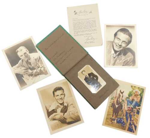 A 20thC photograph album, some bearing autographs to include Errol Flynn, Ronald Reagan, James Craig, further photographs to include Richard Carlson, John Sutton, Robert Preston, John Payne, etc.