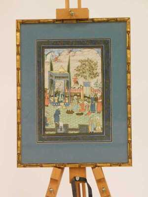 Indian School. Figures in an ornamental garden, watercolour, within a foliate border, 29cm x 21cm. - 2