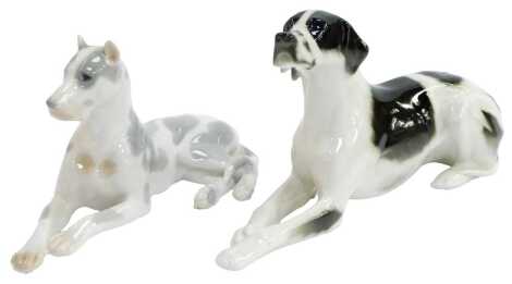 Two Lomonosov porcelain dog figures, comprising a Pointer, 15cm high, and a Great Dane, 13cm high, each seated, with printed marks.