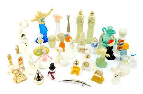 A group of Avon perfume bottles, some with contents, to include longcase clocks, 24cm high, American footballer, seated ballerina, etc. (1 tray)