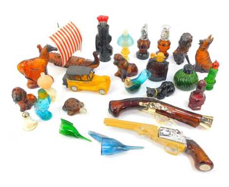 A group of coloured glass Avon perfume bottles, some with contents, to include a flintlock blunderbuss, 30cm long, seated lion, 12.5cm, Viking longboat, etc. (1 tray)