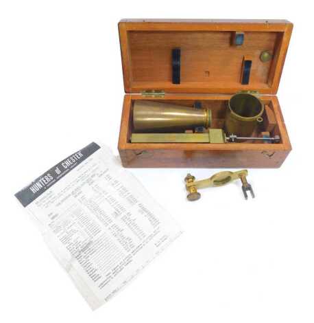 A Victorian brass chondrometer, in a mahogany case, together with a Hunters of Chester photocopied information leaflet providing details regarding seed weight, the case 34cm wide.