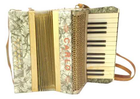 A Carlo Marazini piano accordion, with leather strap, 31cm wide.