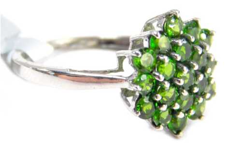 A Coloured Rocks dress ring, the cluster with central stone and two outer halos, set with pale green stones, on a white metal band stamped 925, ring size K, 2.1g all in, boxed.