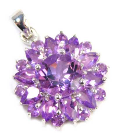 A Coloured Rocks amethyst pendant, formed as a floral cluster set with a central round brilliant cut stone surrounded by various marquise shaped stones, in a white metal setting, stamped 925, 2.5cm high, 3.4g all in.