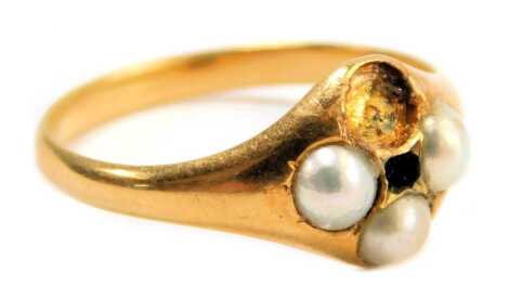 A cultured pearl dress ring, the four cultured pearl arrangement, set with three cultured pearls missing two stones, on a yellow metal band, unmarked, believed to be 18ct, ring size O, 2.9g all in. (AF)