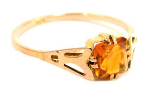 A 9ct gold citrine dress ring, with an asscher cut citrine in a double claw setting, on pierced fan design shoulders, on a thin plain rose gold band, ring size O, 1.5g all in.