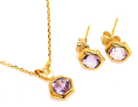 A 9ct gold and amethyst set necklace and earring set, the hexagonal amethyst pendant on a fine 9ct gold chain, 44cm long, with matching earrings, 1.4g all in.