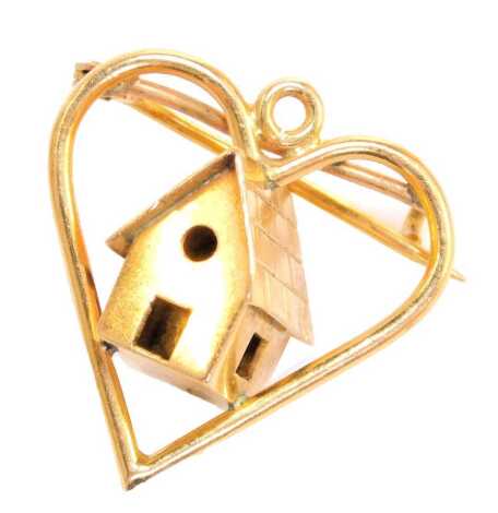 A heart shaped brooch, with cottage pendant drop centre, stamped to bottom 750 18k, 2cm wide, 5g.