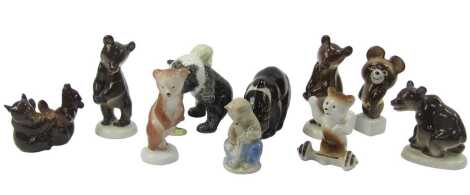 A group of Lomonosov, Russian and other porcelain bear figures, to include a bear and man wrestling, 12cm high, bear playing musical instrument, etc. (10)