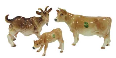 A Melba ware pottery figure modelled as a cow, 28cm high, and calf, 9cm high, together with goat, 18cm high.