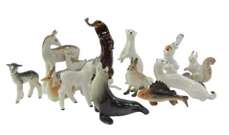 A group of Lomonosov and other porcelain animals, including an otter with fish in its mouth, 21.5cm high, squirrel, deer and fawn, hare playing a trumpet, etc. (1 tray)