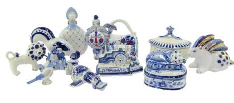 A group of Lomonosov blue and white and other porcelain, including a decanter and stopper modelled as a lion, 15cm high, cannon, 8cm high, scent bottle and stopper, etc. (1 tray)