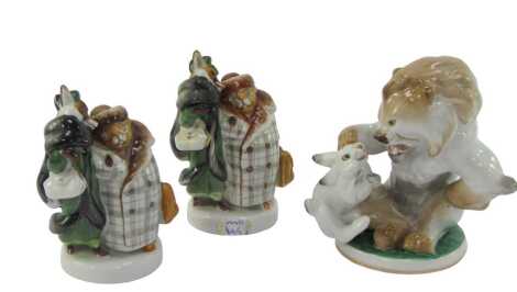 A Lomonosov porcelain figure group modelled as a lion and rabbit fighting, 14cm high, together with two further Russian porcelain figure groups modelled as a beaver and a fox dressed in finery, 11.5cm high. (3)