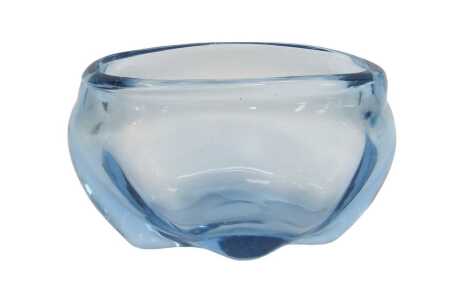 A Whitefriars blue glass bowl, of shaped form, designed by James Hogan, pattern number 9250, 23.5cm wide.