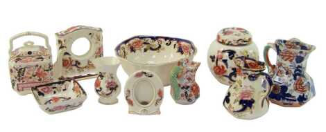 A group of Masons ironstone, predominantly decorated in the Mandalay pattern, to include a ginger jar and cover, 14cm high, mantel clock case, photograph frame, jug, etc. (1 tray)