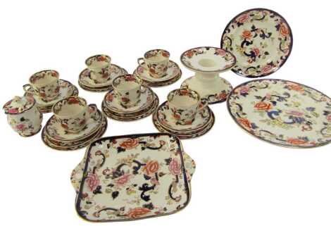 A group of Masons ironstone decorated in the Mandalay pattern, to include teacups and saucers, condiment pot and cover, serving dishes, etc. (1 tray and loose)