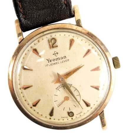 A Yeoman 9ct gold cased wristwatch, with a silvered dial with baton markers, and seconds dial with reverse inscription 'For 40 Years Service for Singer Manufacturer Company', on a brown leather strap, the dial 3cm wide, 21.4g all in. (AF)