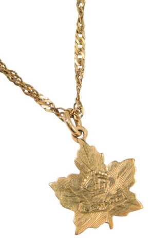 A 9ct gold maple leaf pendant and chain, the maple leaf inscribed Canada, on a rope twist necklace, the pendant 1cm high, the chain 52cm long, 2.7g.