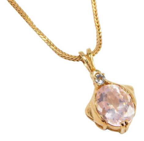 A pendant and chain, the pendant set with cz and pink topaz, 2cm high, on a fancy link neck chain, 16cm long, yellow metal stamped 375, 5.5g all in.