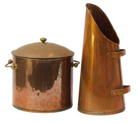 A copper lidded cooking vessel, of cylindrical form with two brass handles and knob, 36cm high, together with a copper coal scuttle, 52cm high. (2)