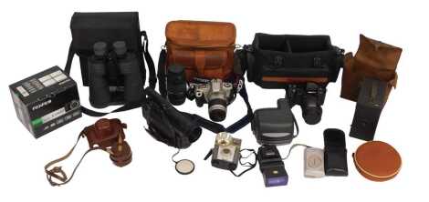 Various cameras and optical equipment, to include a JB Ensign box camera, in canvas case, a Canon EOS 300 camera with 75x300mm lens, Panasonic camcorder, Polaroid camera, digital cameras, etc. (1 box)