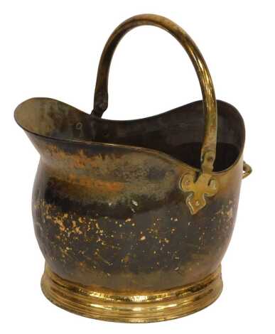 A late 19th/early 20thC brass coal scuttle, with ring handle, 28cm high.