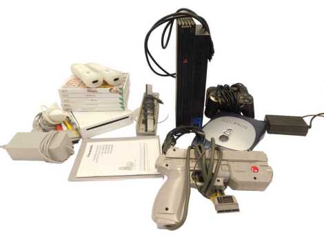 A Sony Playstation 2, together with controllers, etc., and a Nintendo Wii console, games, to include Wii Sport, Golden Balls, etc.