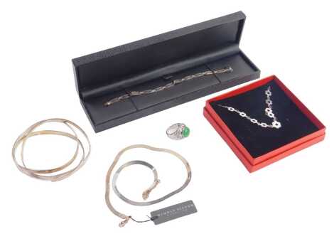 A group of silver and other jewellery, comprising pendants and chains, bangles, stone set pendants, etc. (a quantity)