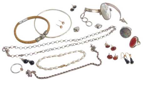 A small group of silver and other jewellery, comprising earrings, mother of pearl bracelet, torc bangle, dress rings, etc. (a quantity)