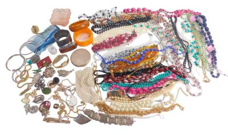 A group of costume jewellery, comprising plastic bangles, drop necklaces, Stratton compacts, etc. (1 box)