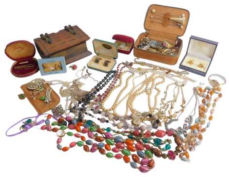 Assorted costume jewellery, including silver cased fob watch, butterfly filigree pendant, further silver brooches, crystal style necklaces and bracelets, earrings, dress rings, some jewellery tins, etc. (1 tray)