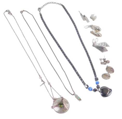 A group of silver and other jewellery, comprising necklaces, heart shaped magnetic necklace, drop earrings, etc. (a quantity)