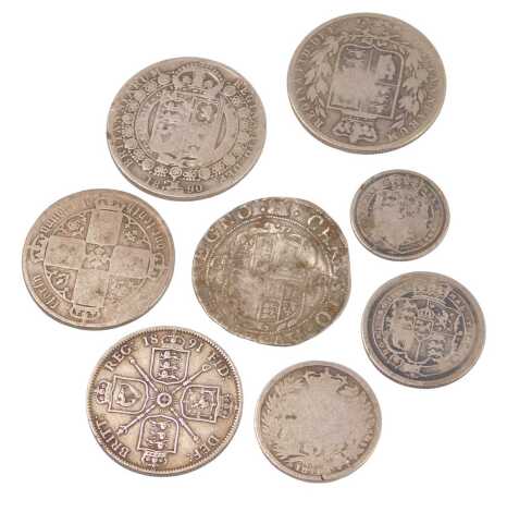 George III and later coinage, comprising two Victoria crowns dated 1877 and 1890, a Carlos II crown with rubbed date, a Victoria 1891 half crown, a silver florin and two other rubbed coins. (8)