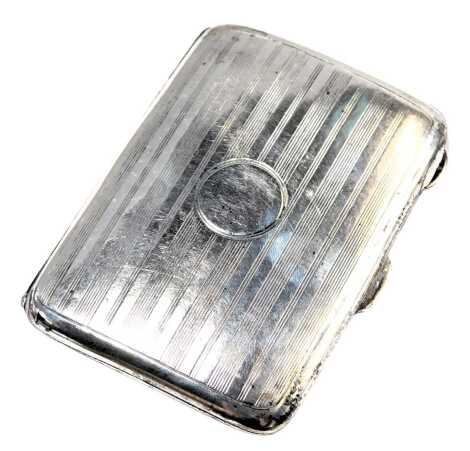 A George V silver cigarette case, with engine turned decoration, of rectangular form, striped decoration and vacant cartouche, Birmingham 1915, 1.91oz.