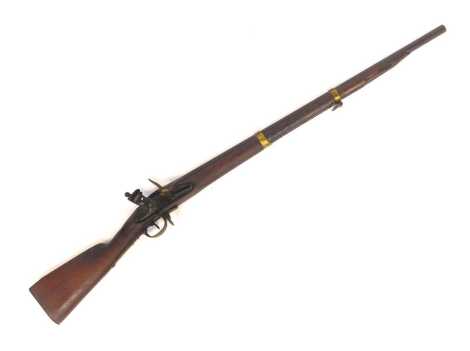 A 19thC flintlock rifle, with wooden stock, 122cm long. (AF)