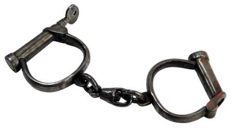 A pair of Hiatts iron handcuffs, with key, 7cm diameter.