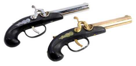 Two novelty pistol lighters, 19cm long. (2)