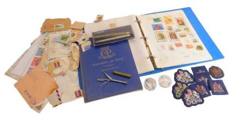 Various World and GB used stamps, together with two silver plated coins, Parker pen, cloth badges, etc.