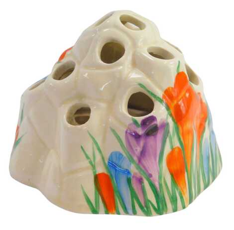 A Clarice Cliff Bizarre Crocus pattern flower holder, 8cm high.