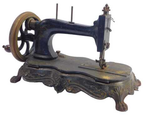 A 19thC Junker and Ruh cast iron sewing machine, no. 70866, 21cm high, 41cm wide.